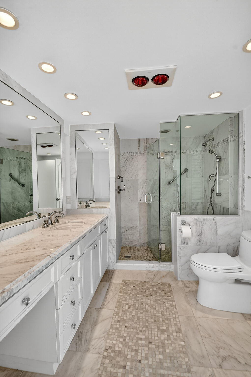 2780 South Ocean Boulevard, Unit 703 Palm Beach, FL 33480 - Photo 20 of 44 a spacious bathroom with a double vanity sink toilet mirror and bathtub