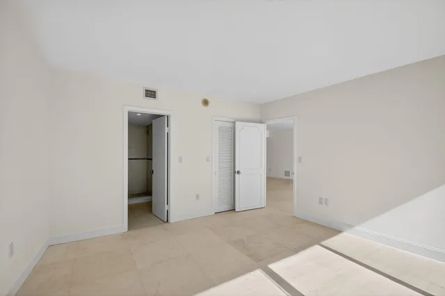 a view of balcony and wooden floor