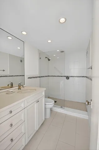 a view of a hallway with white walls