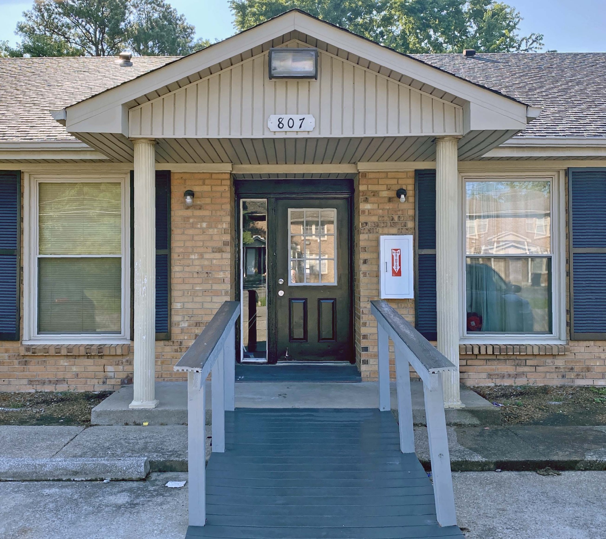 807 Golf View Place, Unit C Clarksville, TN 37043 - Photo 1 of 24 a front view of a house with glass windows and door
