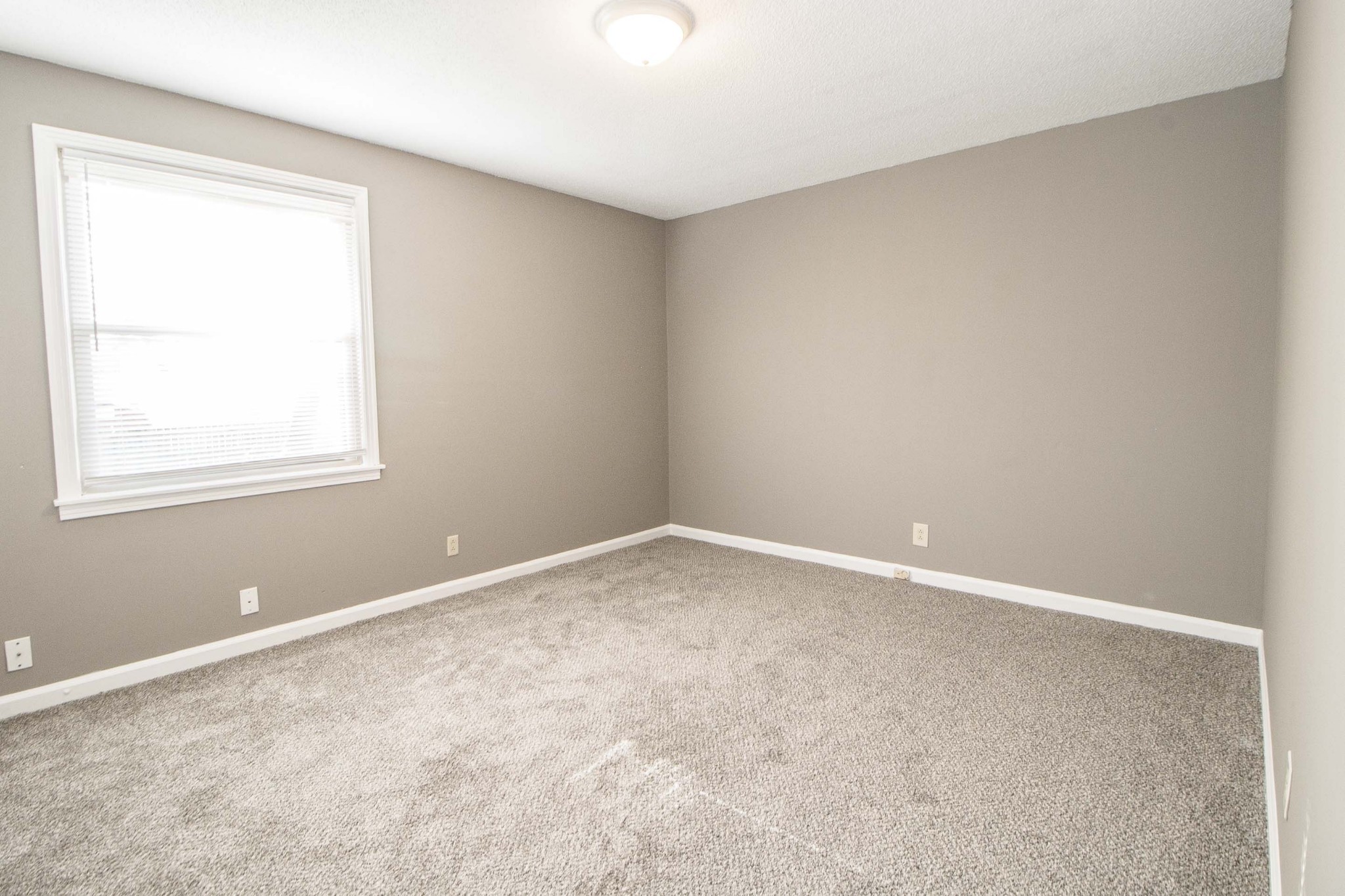 807 Golf View Place, Unit C Clarksville, TN 37043 - Photo 20 of 24 an empty room with a window
