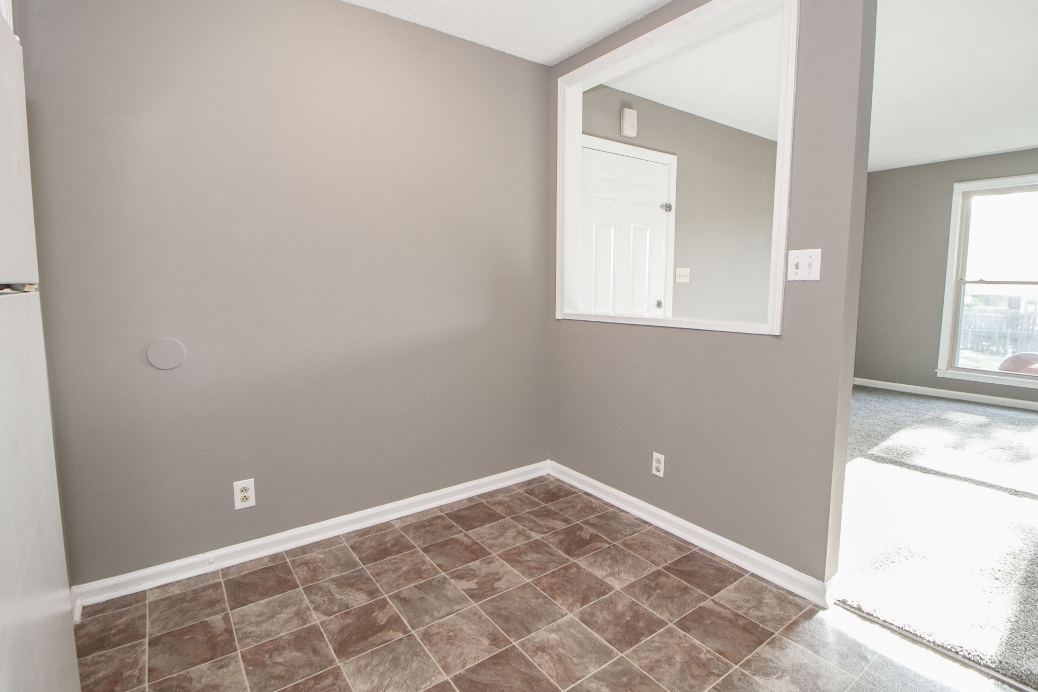 807 Golf View Place, Unit C Clarksville, TN 37043 - Photo 10 of 24 a view of a small space with wooden floor and a window