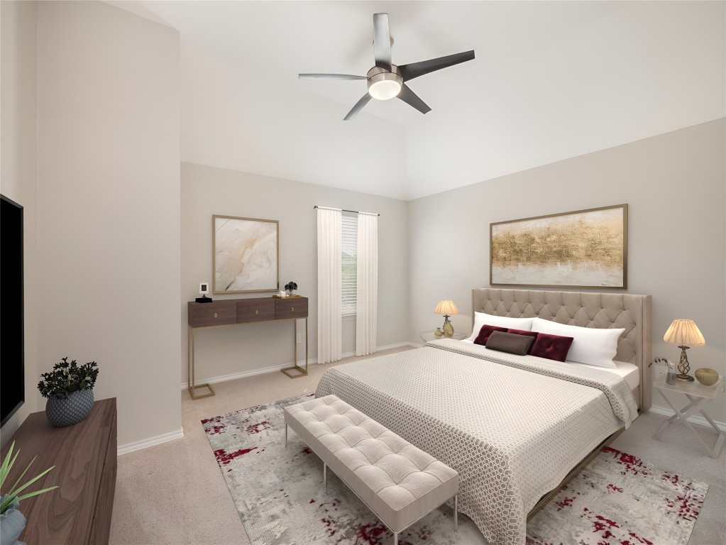 406 Primavera Loop Kyle, TX 78640 - Photo 32 of 38 a bedroom with a bed and a chandelier