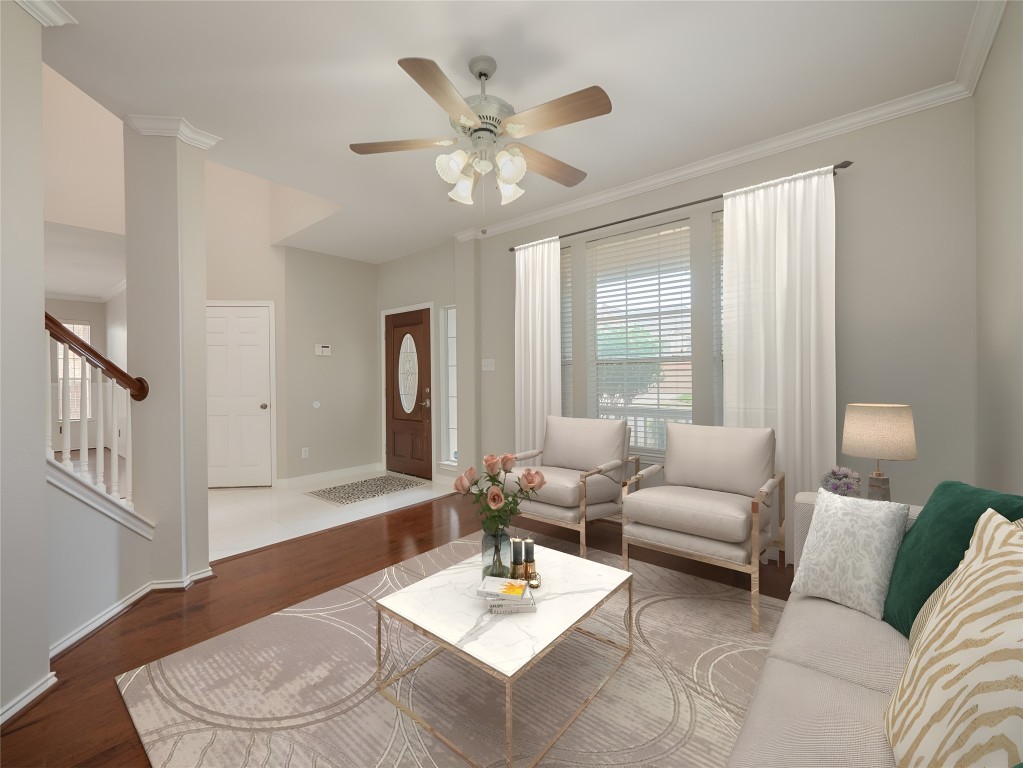 406 Primavera Loop Kyle, TX 78640 - Photo 4 of 38 a living room with furniture and a large window
