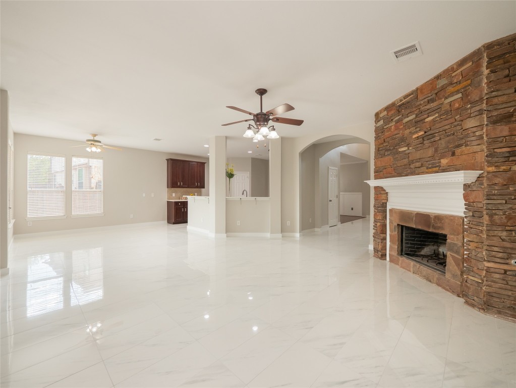 406 Primavera Loop Kyle, TX 78640 - Photo 9 of 38 a view of a livingroom with a fireplace