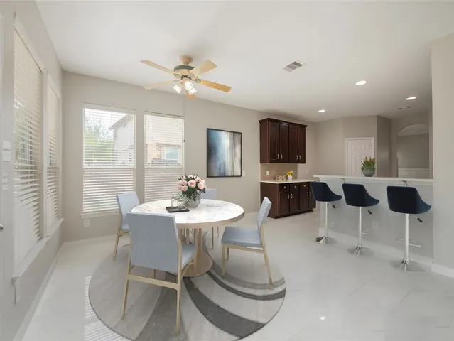 a view of a dining room with furniture