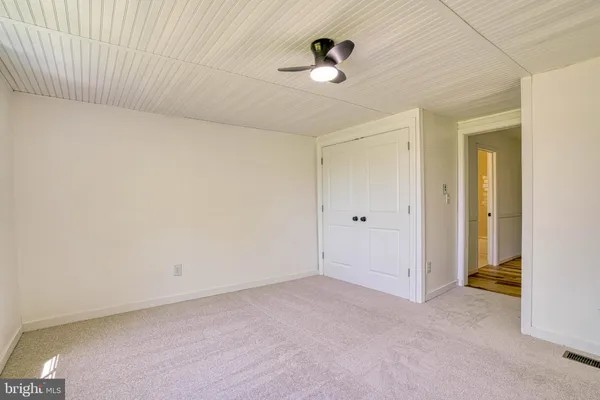 a view of a livingroom with an empty space