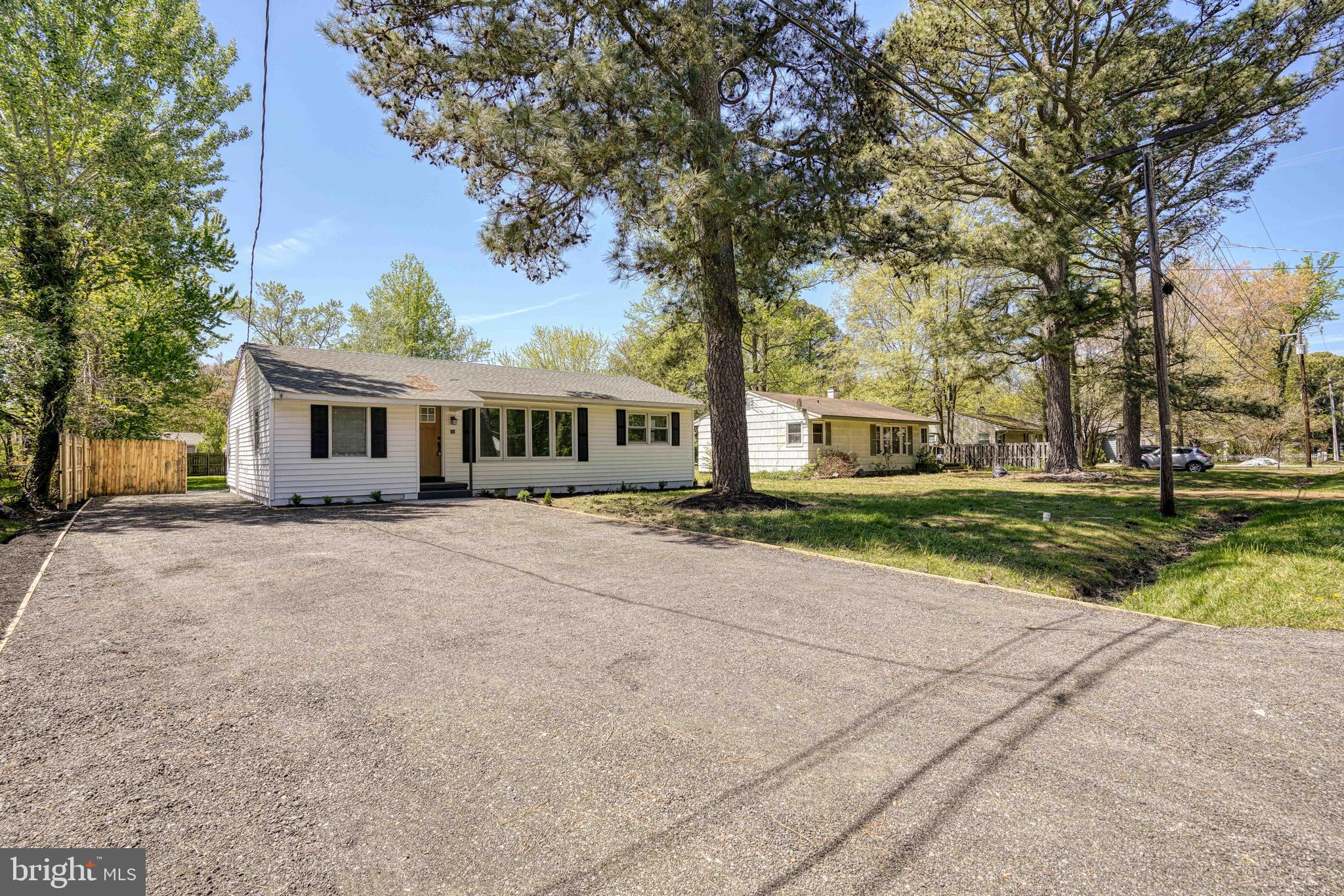 10 Bay View Avenue Cambridge, MD 21613 - Photo 2 of 28 front view of a house with a yard