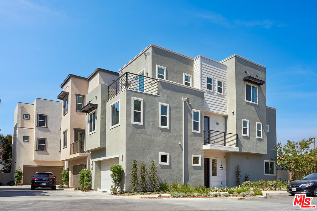 a front view of a building with street view