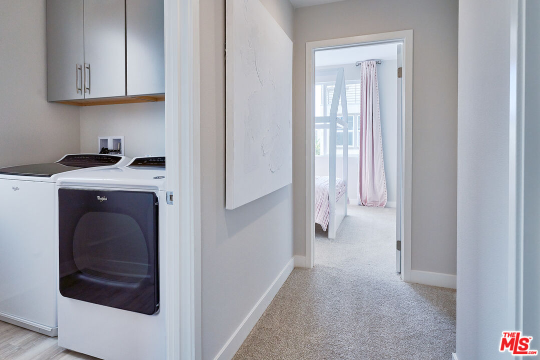 525 Daniel Freeman Circle Inglewood, CA 90301 - Photo 20 of 39 a view of a kitchen with washer and dryer
