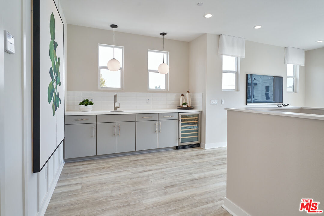 525 Daniel Freeman Circle Inglewood, CA 90301 - Photo 23 of 39 a kitchen with stainless steel appliances a sink stove and cabinets