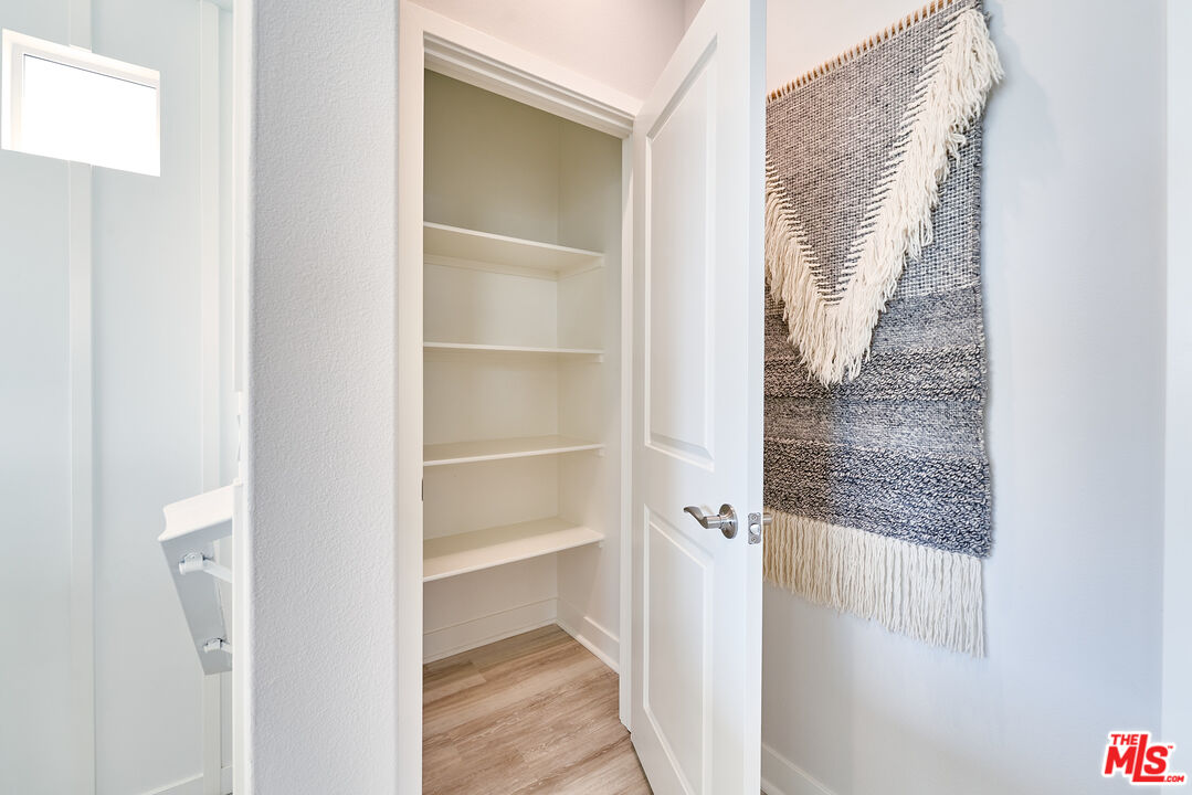 525 Daniel Freeman Circle Inglewood, CA 90301 - Photo 29 of 39 a view of a hallway with wooden floor and entryway