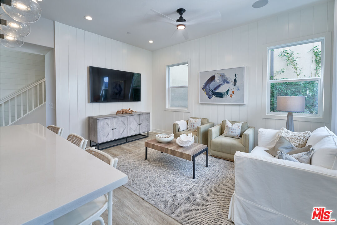 525 Daniel Freeman Circle Inglewood, CA 90301 - Photo 9 of 39 a living room with furniture and a flat screen tv
