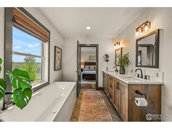 a view of a house with backyard porch and sitting area