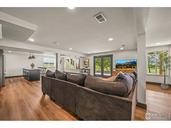 a kitchen with sink a counter and cabinets