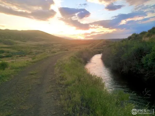 a view of a city with mountains in the background
