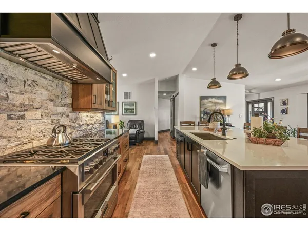 a view of a hallway with washer and dryer