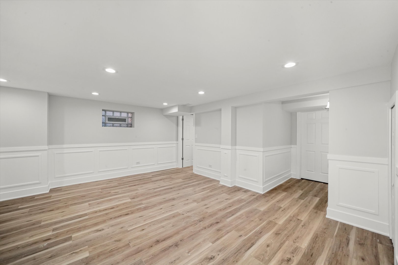 9322 South Justine Street Chicago, IL 60620 - Photo 12 of 27 a view of an empty room with wooden floor
