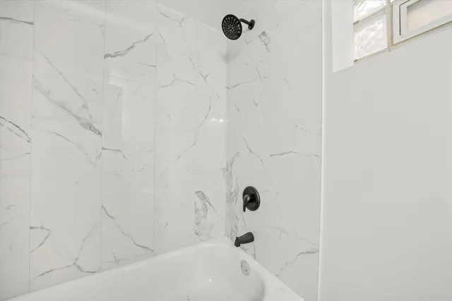 a bathroom with a bathtub