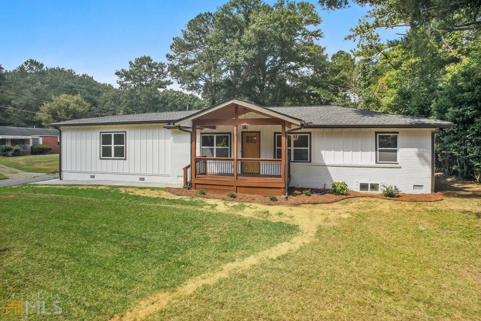 362 Fairburn Road Southwest Atlanta, GA 30331 - Photo 1 of 1 a front view of a house with a garden