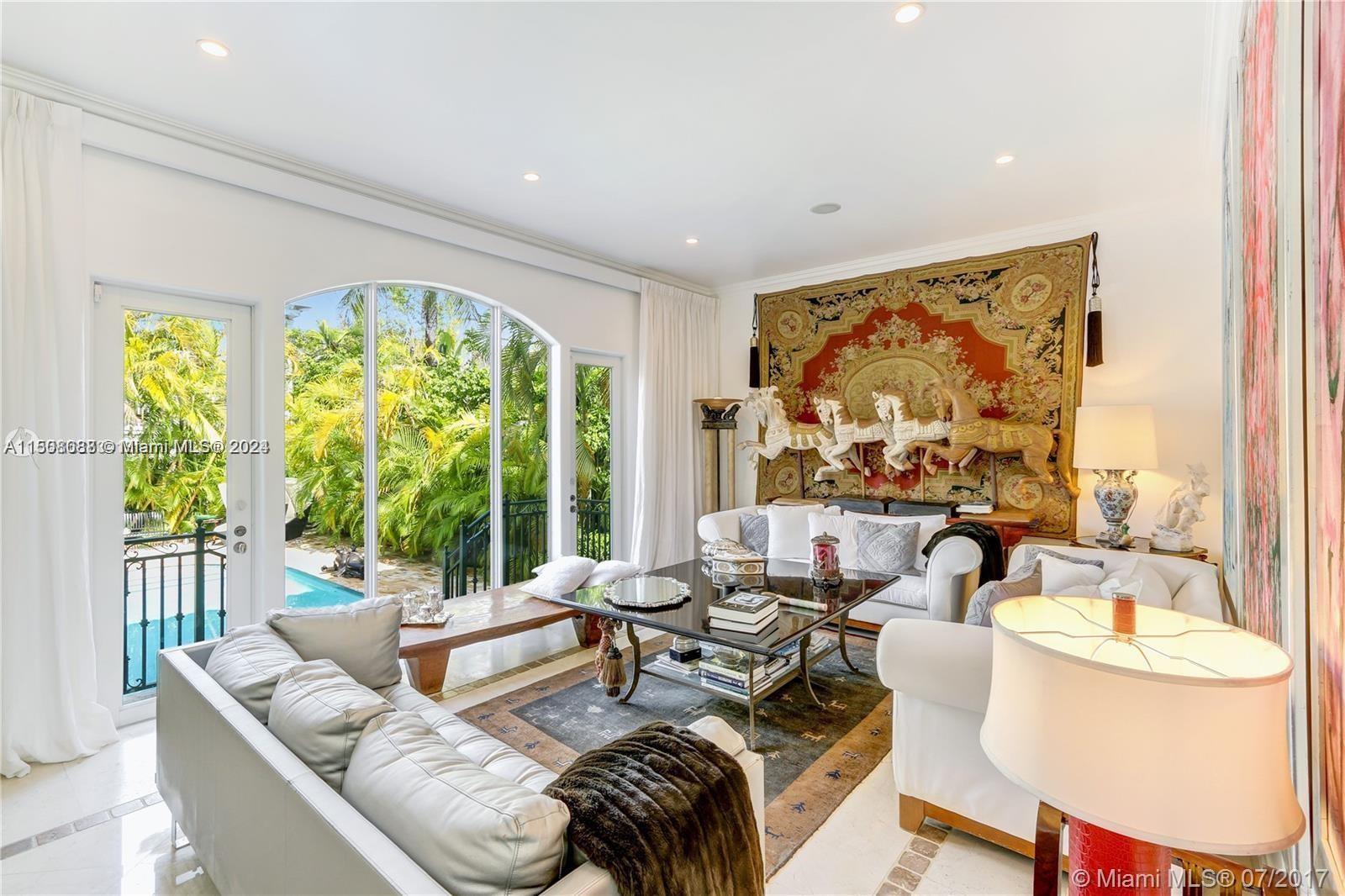 270 Ridgewood Road Key Biscayne, FL 33149 - Photo 8 of 15 a living room with furniture and a large window
