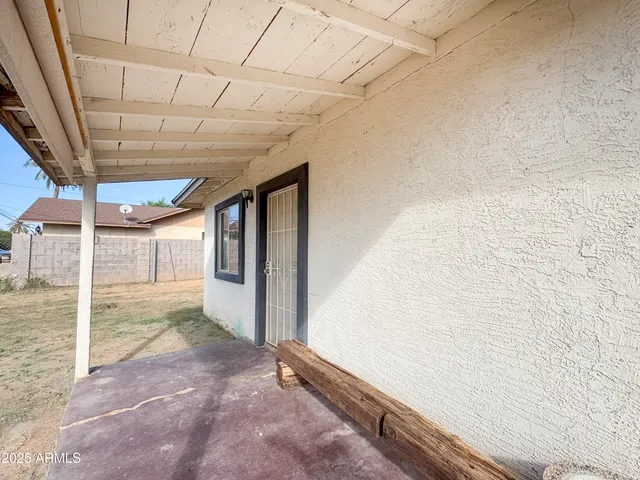 a view of a big room with wooden walls