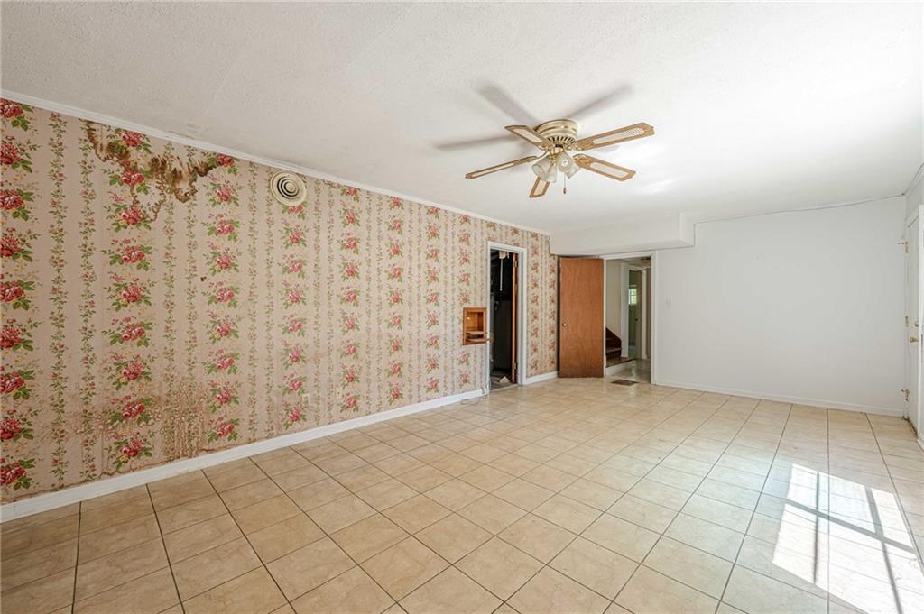 1502 North Druid Hills Road Brookhaven, GA 30319 - Photo 30 of 46 a view of an empty room with a window