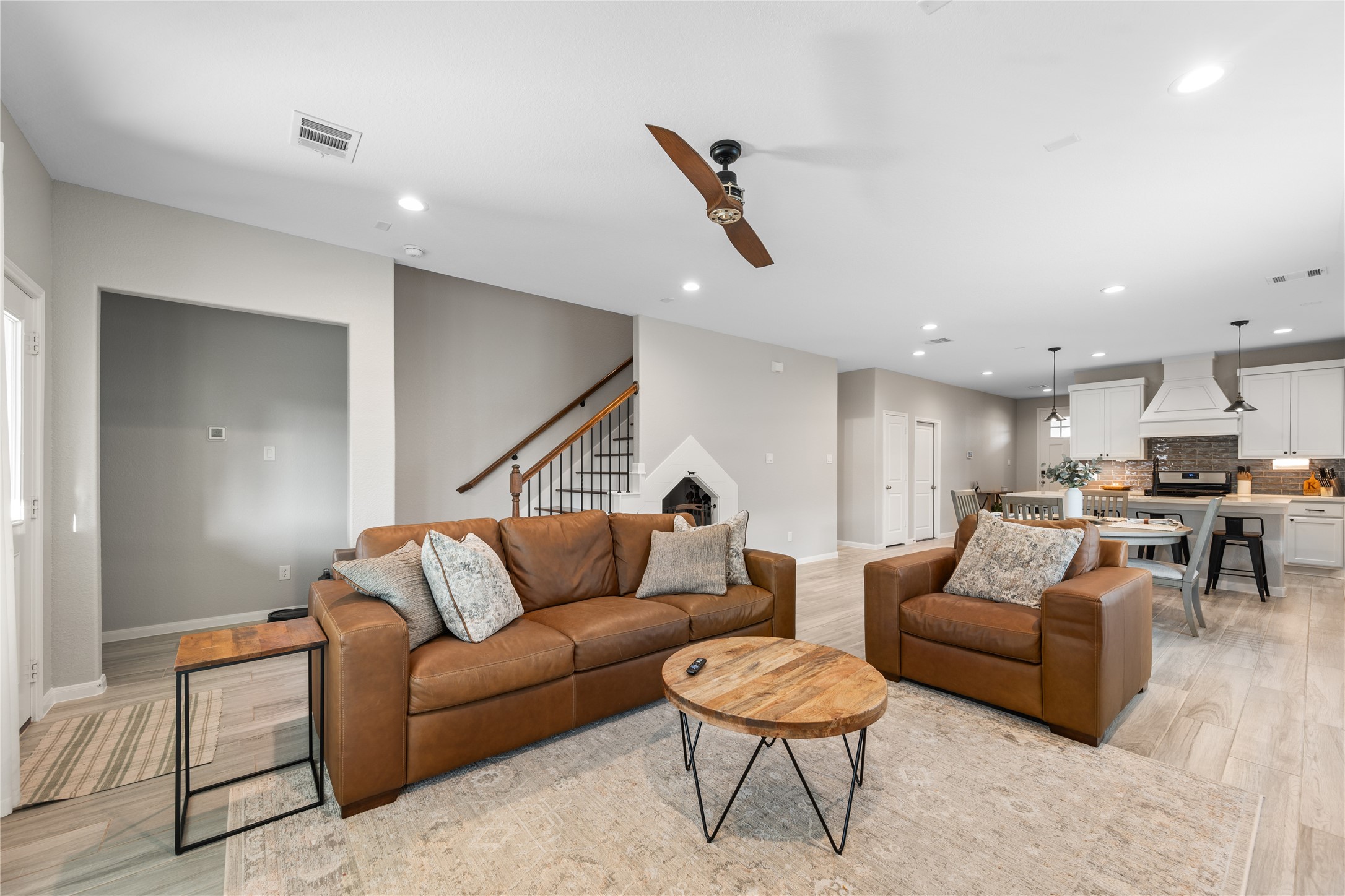 2504 Hagerman Road Conroe, TX 77384 - Photo 20 of 50 a living room with furniture and a ceiling fan