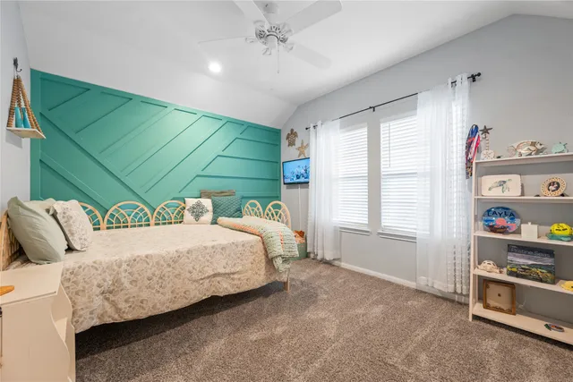 a view of workspace with furniture and window