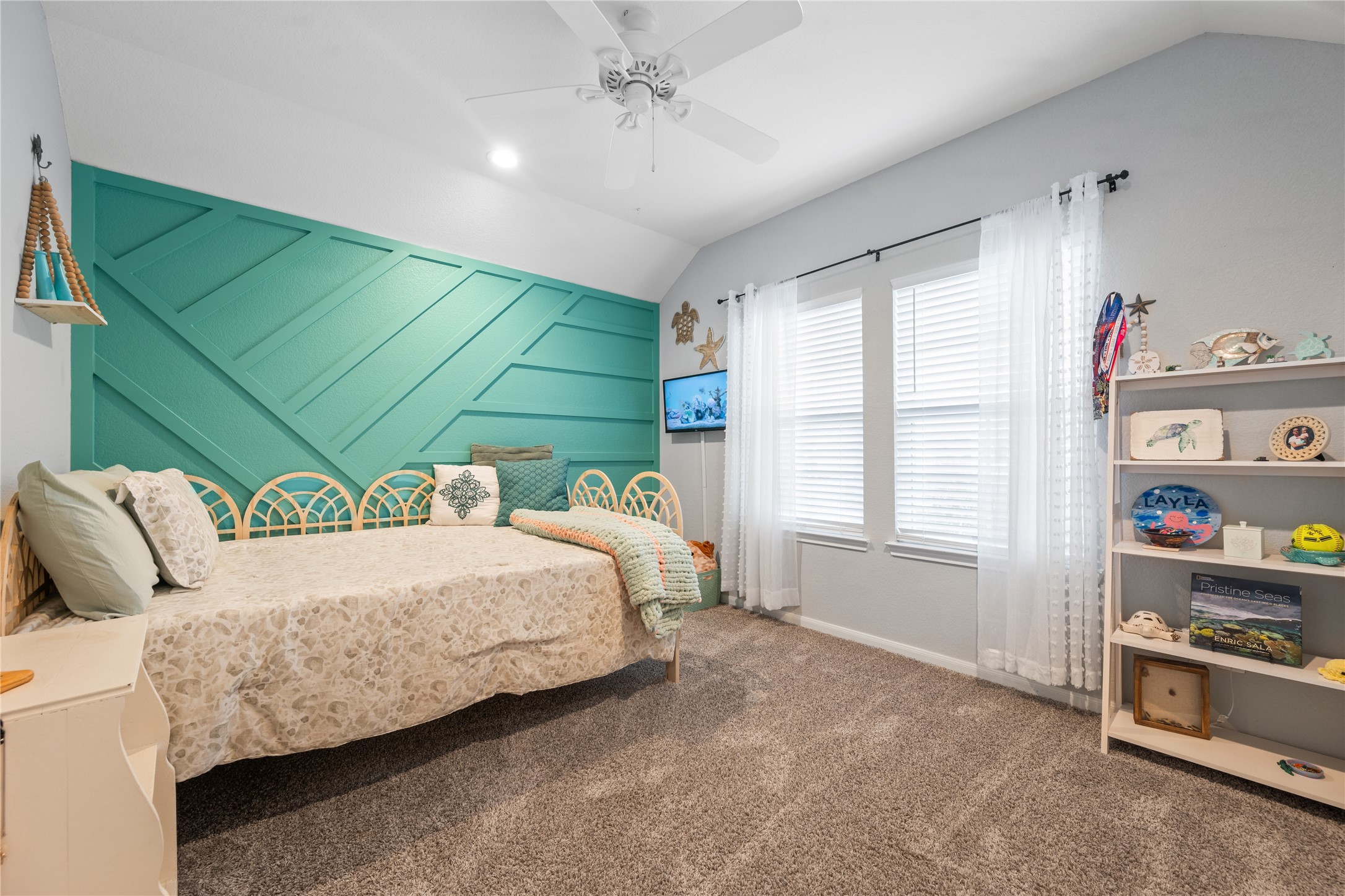 2504 Hagerman Road Conroe, TX 77384 - Photo 37 of 50 a bedroom with a bed and a window