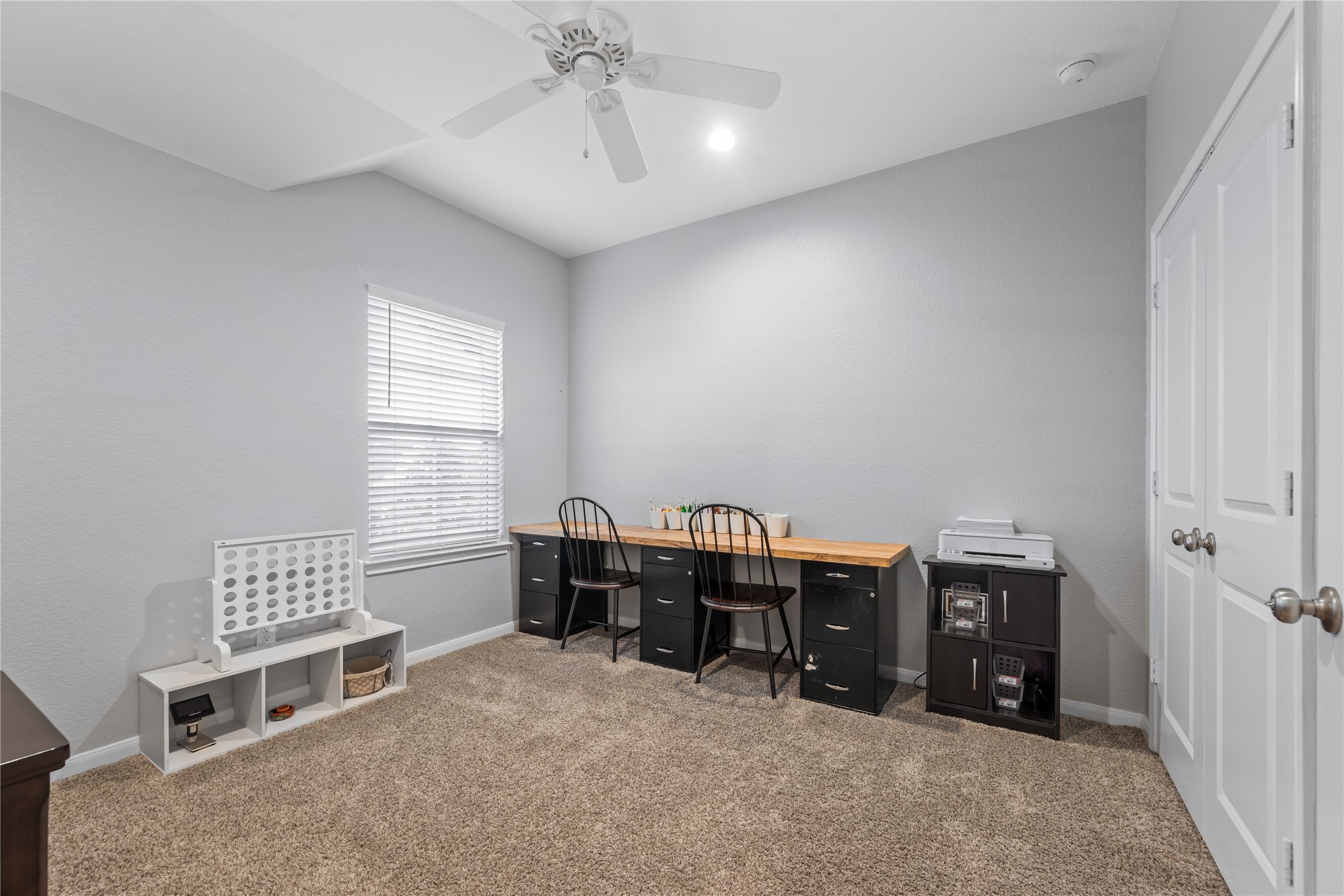 2504 Hagerman Road Conroe, TX 77384 - Photo 38 of 50 a view of workspace with furniture and window