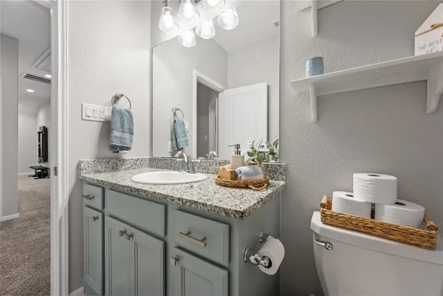 a living room with furniture and a garden