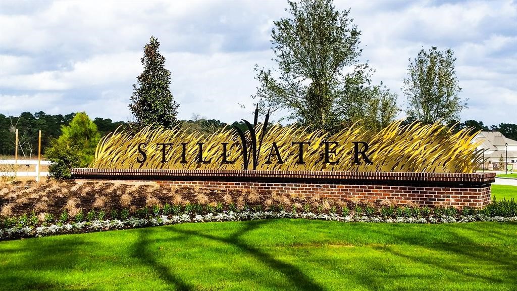 2504 Hagerman Road Conroe, TX 77384 - Photo 50 of 50 a view of a yard with a street sign