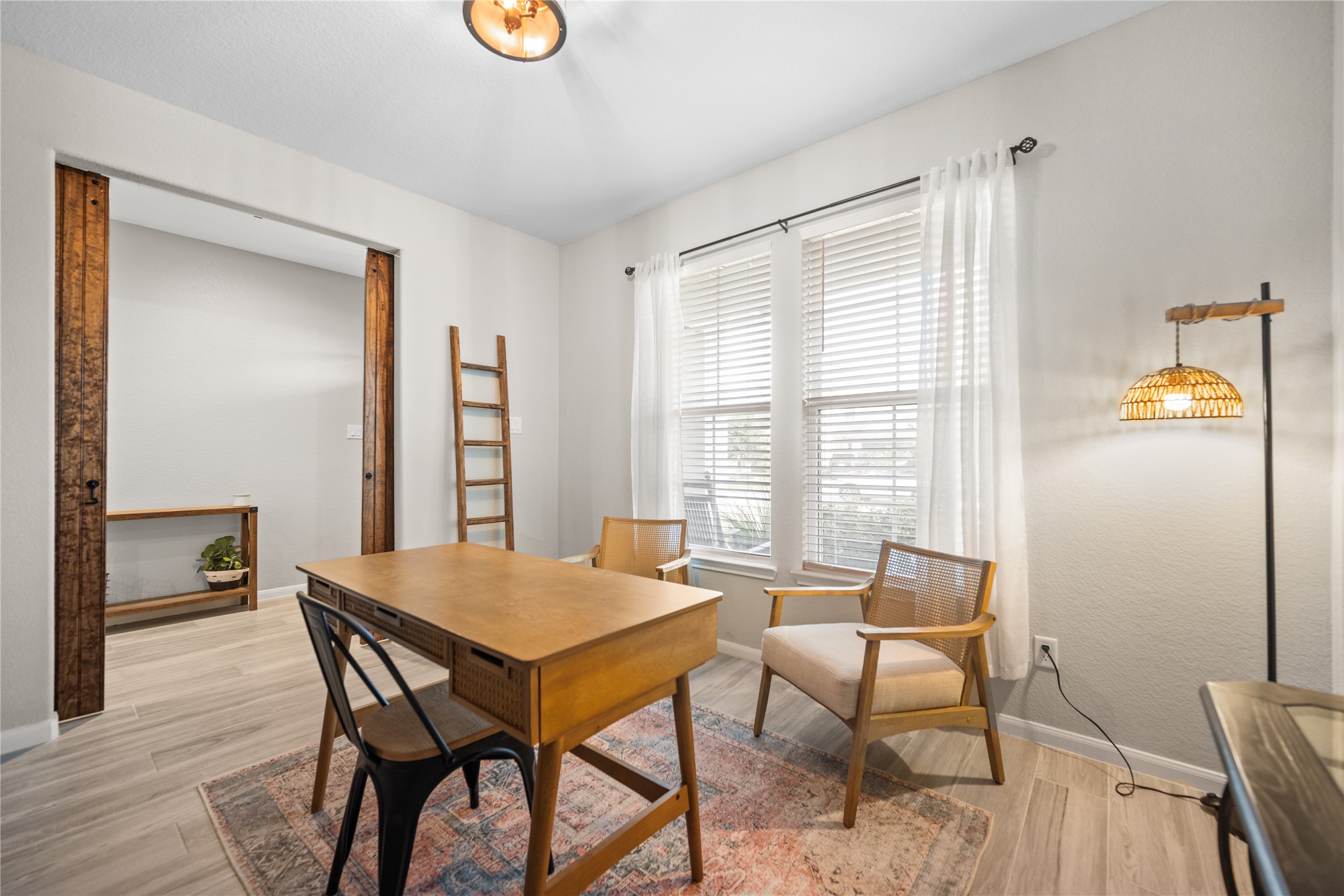 2504 Hagerman Road Conroe, TX 77384 - Photo 8 of 50 a view of a dining room with furniture and a window
