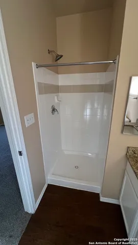 an aerial view of a house having swimming pool having outdoor seating