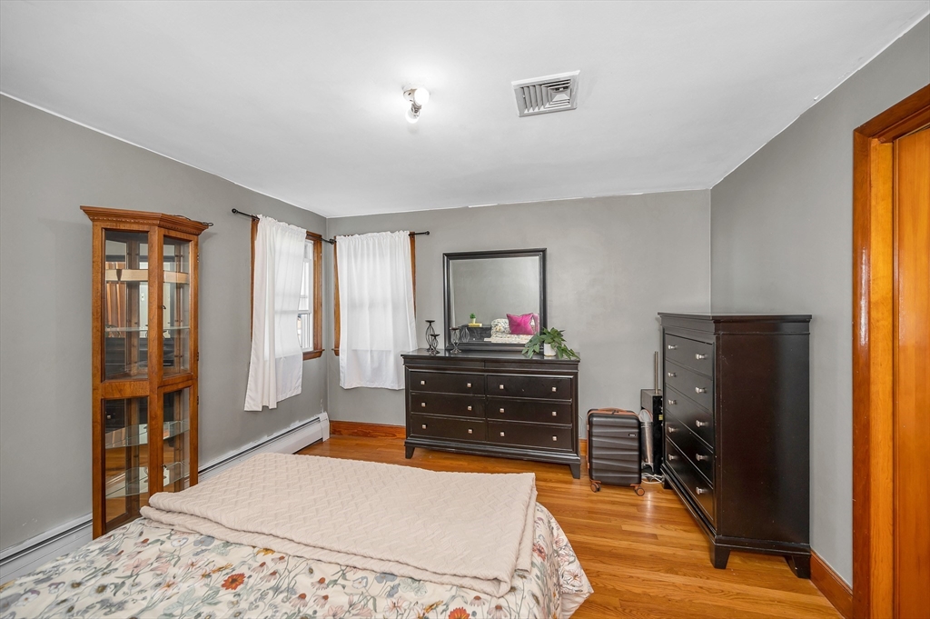 7 Marie Street Methuen, MA 01844 - Photo 15 of 39 a bed room with a bed and a television