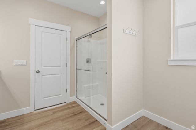 157 West 100 South Joseph, UT 84739 - Photo 16 of 30 Full bathroom featuring light wood-type flooring and a shower stall