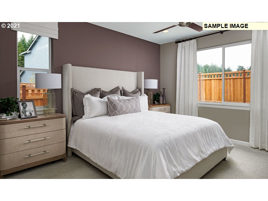 3002 North Mccanta Way Ridgefield, WA 98642 - Photo 8 of 10 a bedroom with a bed and window