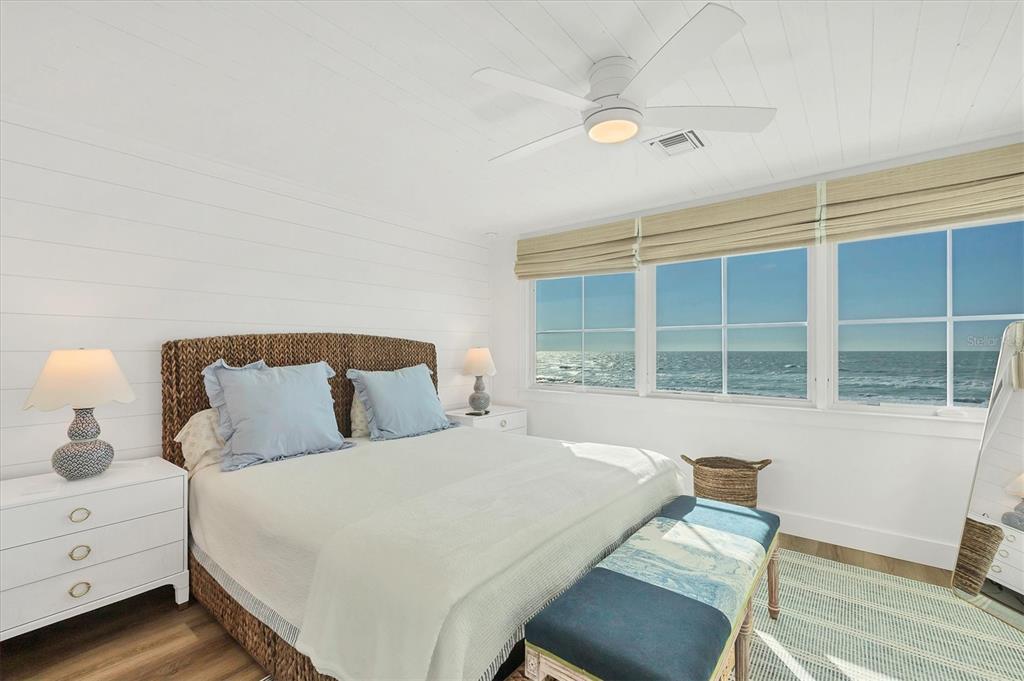 290 Gulf Boulevard, Unit 17 Boca Grande, FL 33921 - Photo 18 of 39 a large bed sitting in a bedroom next to a window