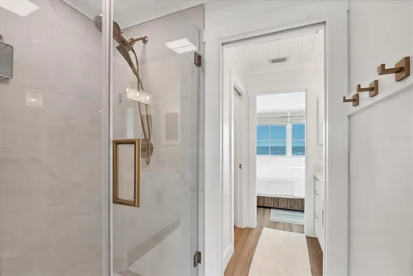 a bathroom with a tub and shower