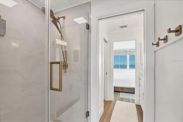 a bathroom with a tub and shower