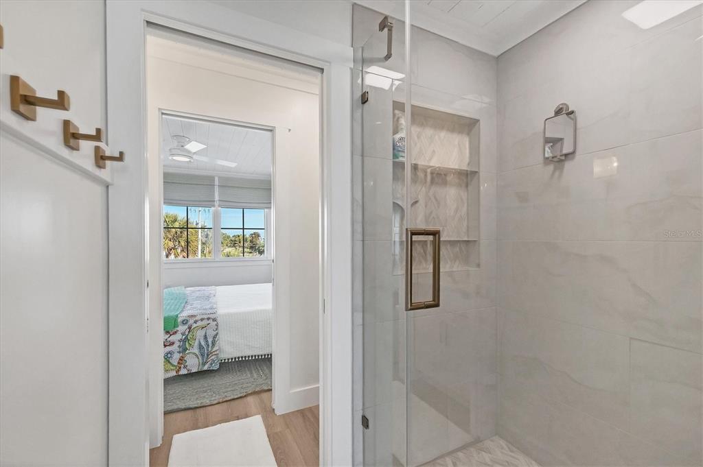 290 Gulf Boulevard, Unit 17 Boca Grande, FL 33921 - Photo 23 of 39 a bathroom with a shower