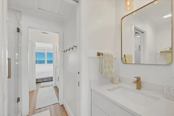 a bathroom with a sink and a mirror