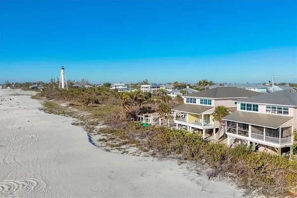 a view of a large building with a yard