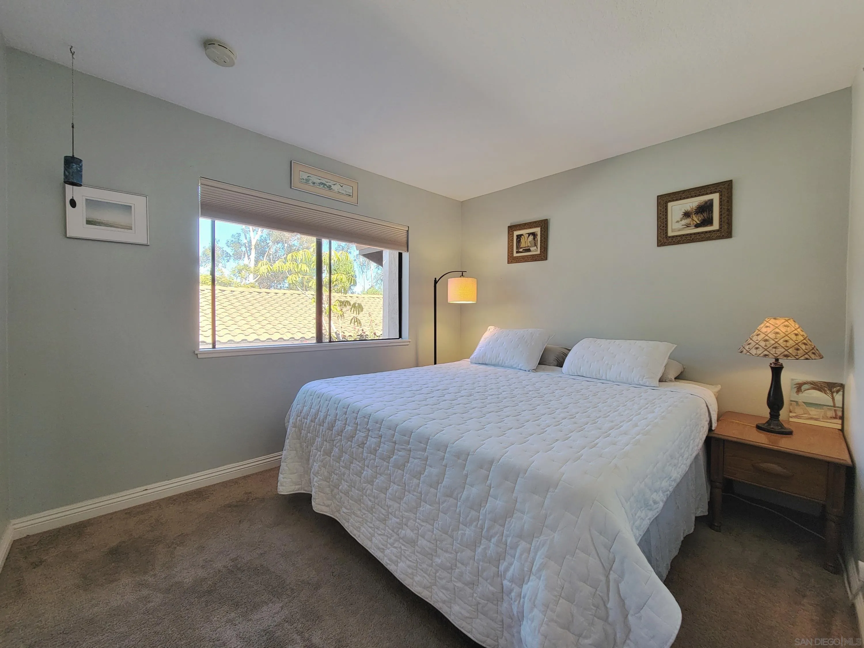116 South Darien Drive Encinitas, CA 92024 - Photo 15 of 27 a bedroom with a bed and window