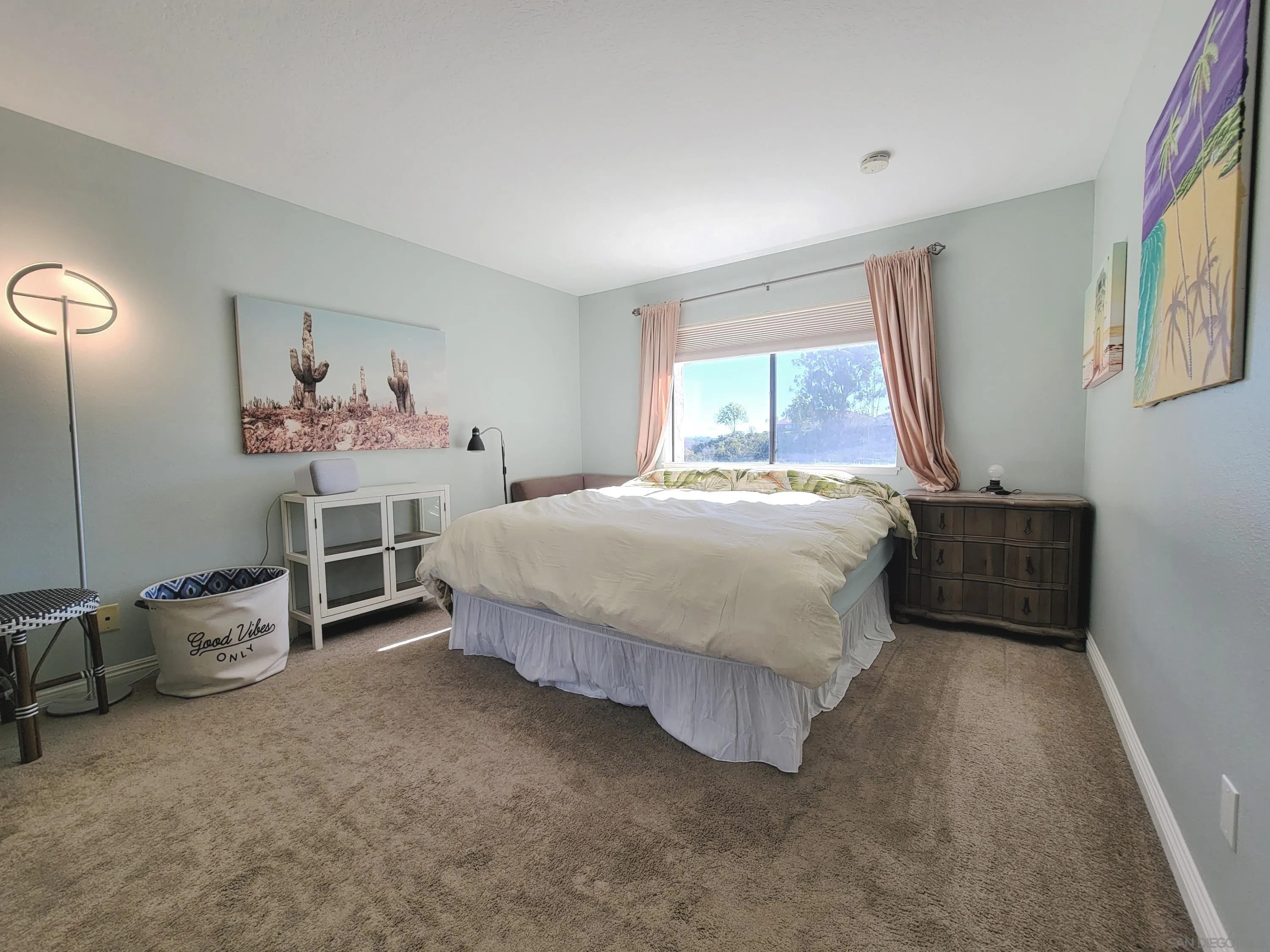 116 South Darien Drive Encinitas, CA 92024 - Photo 19 of 27 a bedroom with a bed and a window