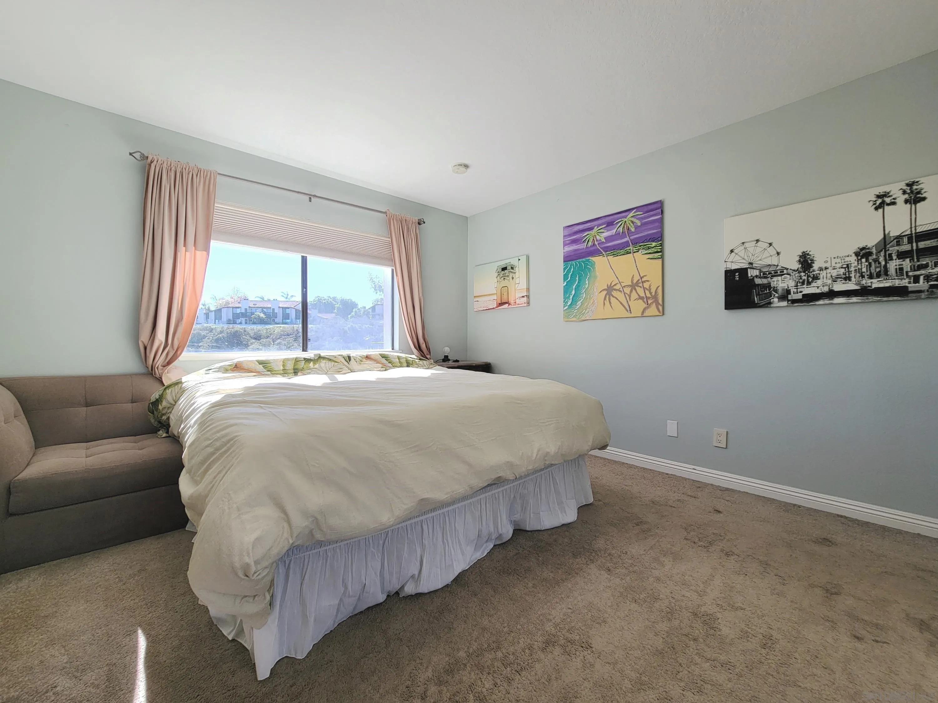 116 South Darien Drive Encinitas, CA 92024 - Photo 21 of 27 a bedroom with a bed and glass window