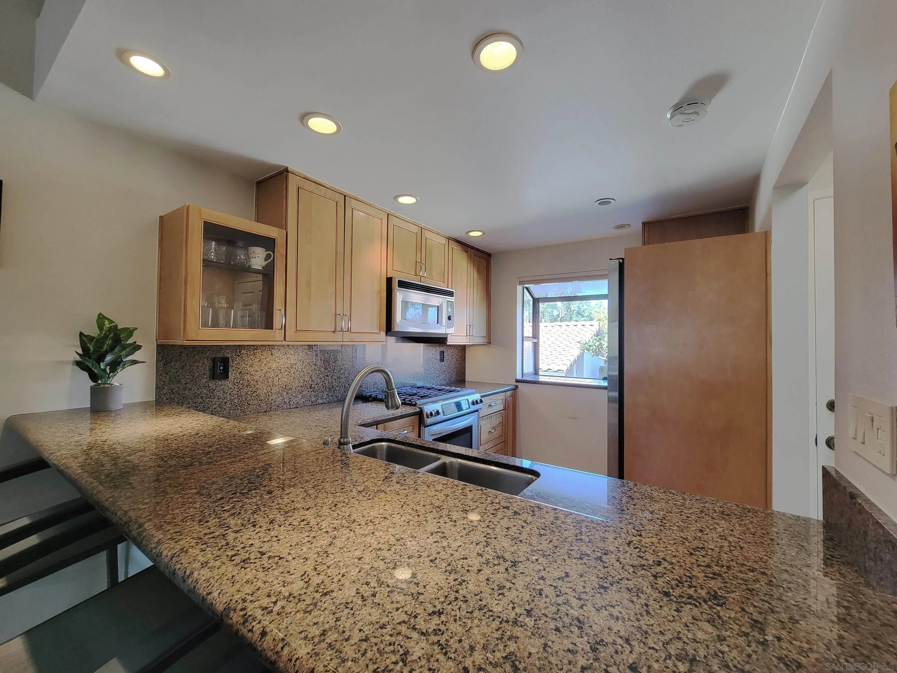 116 South Darien Drive Encinitas, CA 92024 - Photo 4 of 27 a living room with furniture and a window