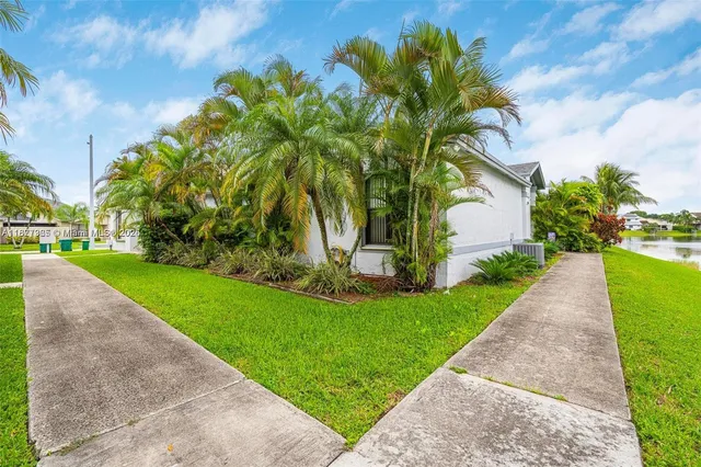 a view of a garden with a fountain