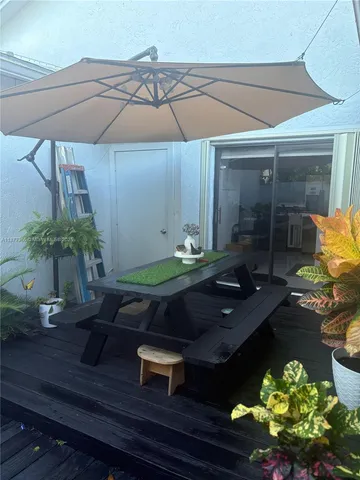 a room with lots of potted plants